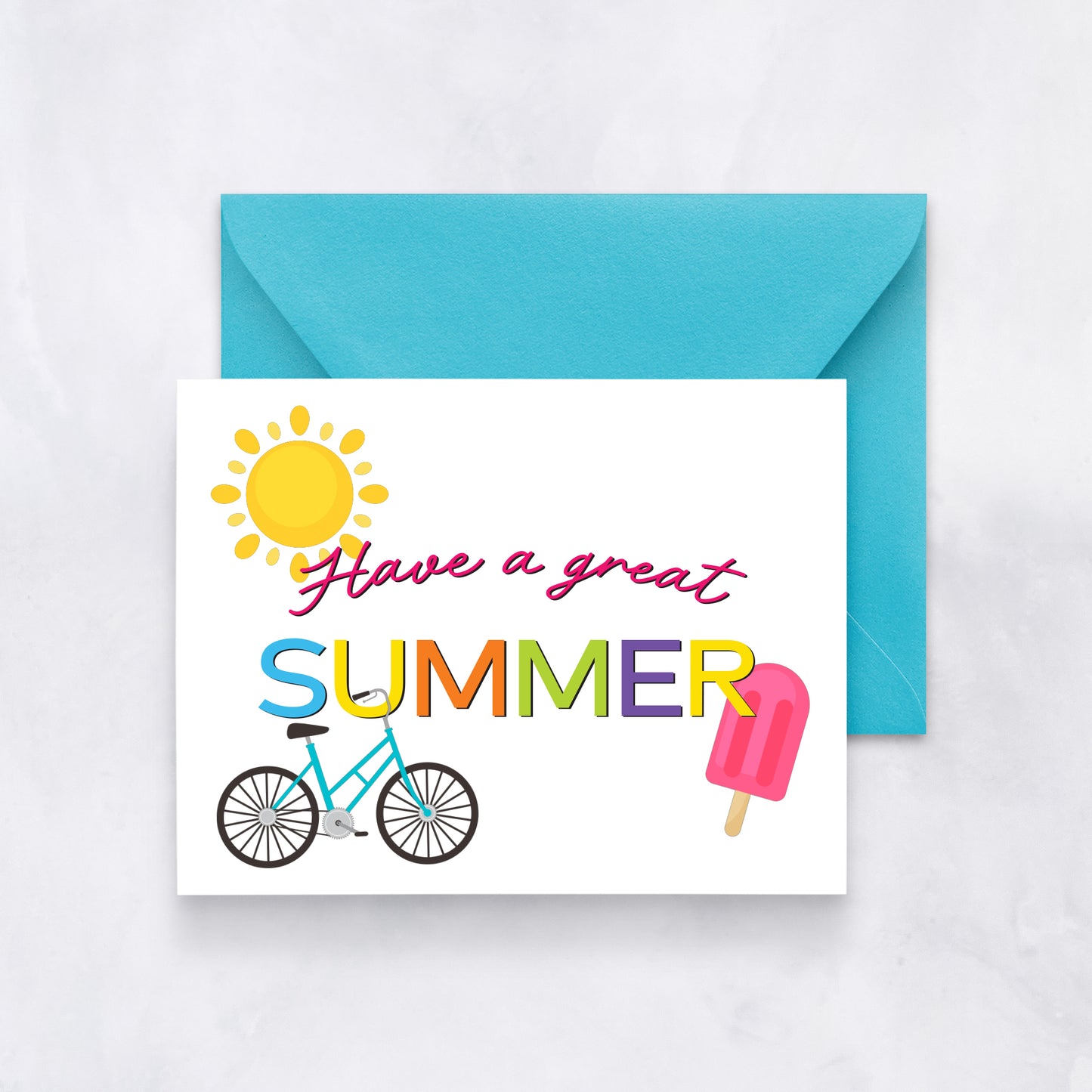 White card with bright illustrations of a sun, popsicle, and bike and text reading “Have a great summer,” paired with a turquoise envelope.
