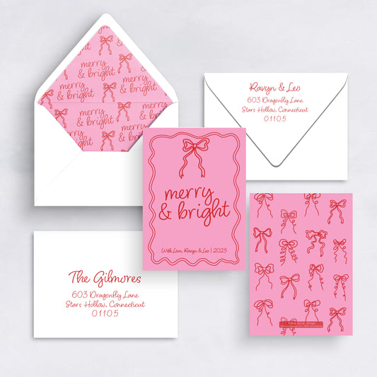 Bright pink Merry & Bright Christmas card with red bow illustrations and matching liner.