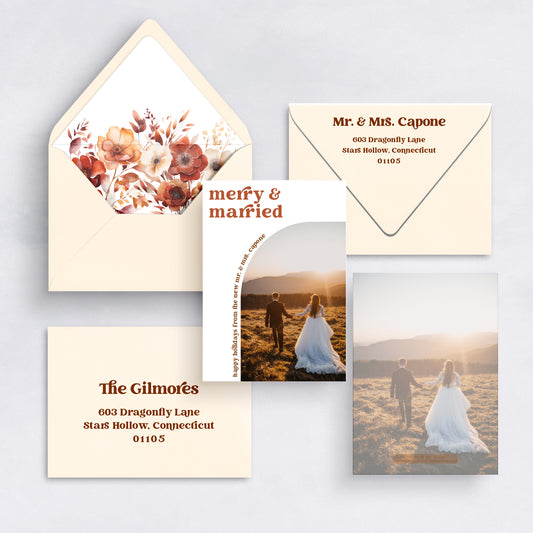 Warm floral Merry & Married Christmas card with fall tones and photo of newlywed couple.