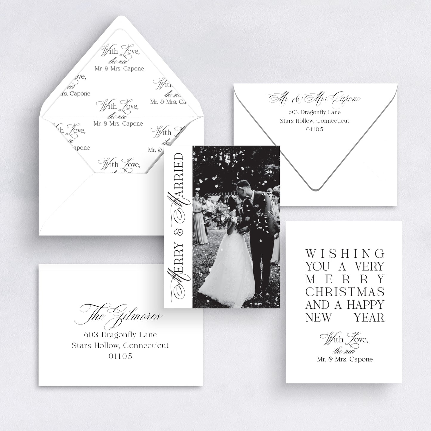 Black and white Merry & Married vertical Christmas card with couple photo and elegant typography.