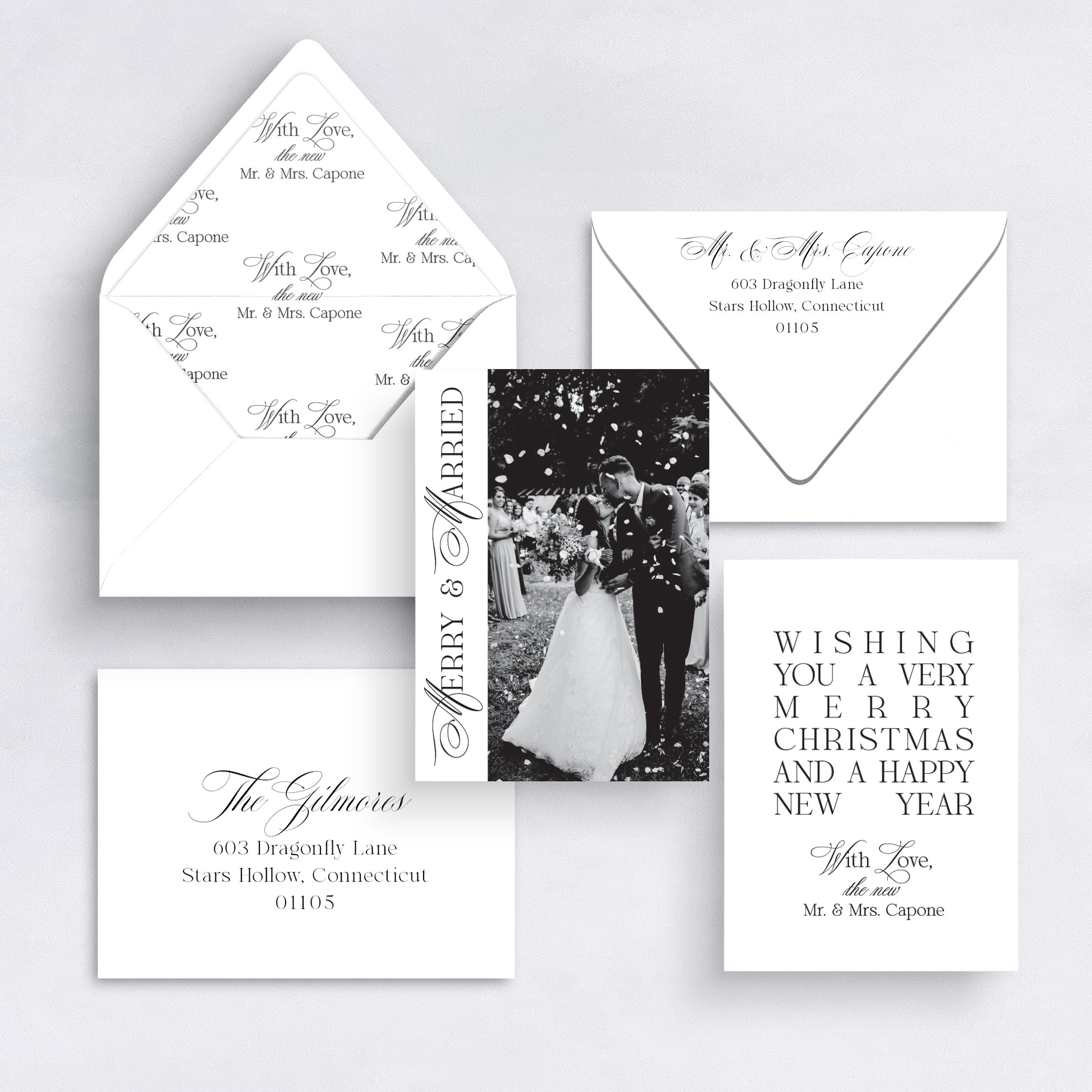 Black and white Merry & Married vertical Christmas card with couple photo and elegant typography.