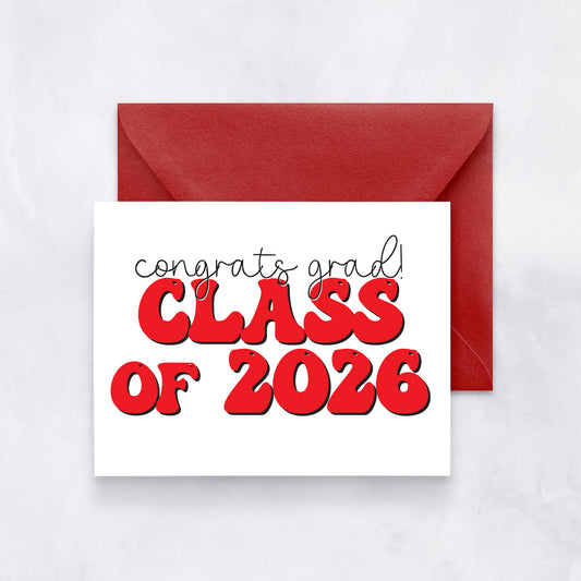 White card with “Congrats grad! Class of 2026” in red bubble letters, paired with a red envelope.