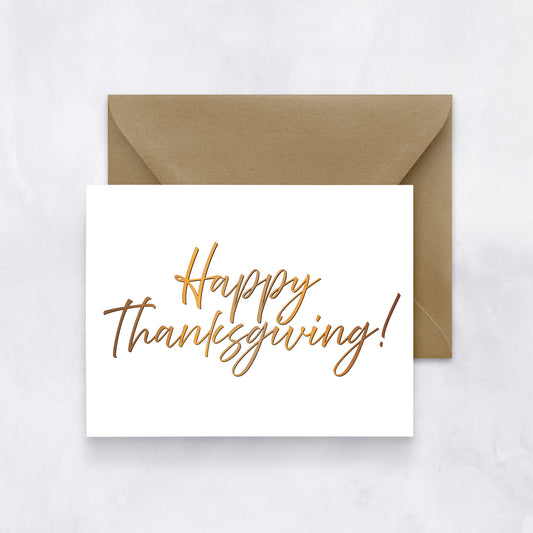 White card with “Happy Thanksgiving!” written in golden-brown script, paired with a tan envelope.