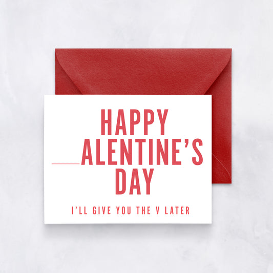 White card with bold red text reading “Happy _alentine’s Day – I’ll give you the V later,” paired with a red envelope.