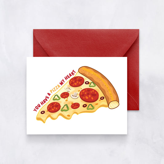 White card with illustrated slice of pepperoni pizza and curved red text reading “You have a pizza my heart,” styled with a red envelope.